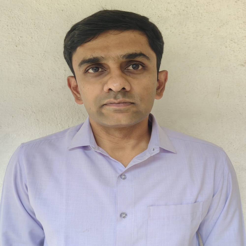 Dr. K. C. Manu