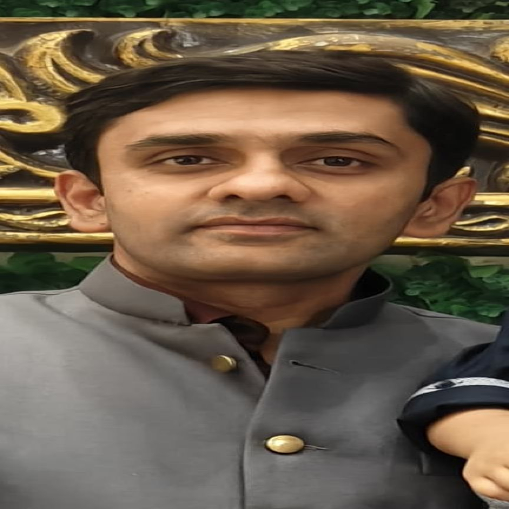 Dr. K. C. Manu